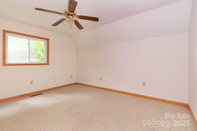 307 Five Star Dr, Glenville, NC 28736 - bonus room featuring carpet floors, lofted ceiling, baseboards, and ceiling fan