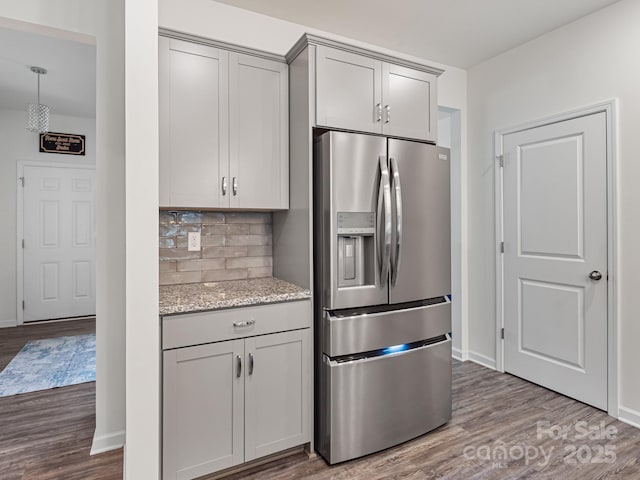 6381 Trinity Crossing Cir, Kannapolis, NC 28081 - kitchen with stainless steel refrigerator with ice dispenser, dark wood finished floors, gray cabinets, and tasteful backsplash
