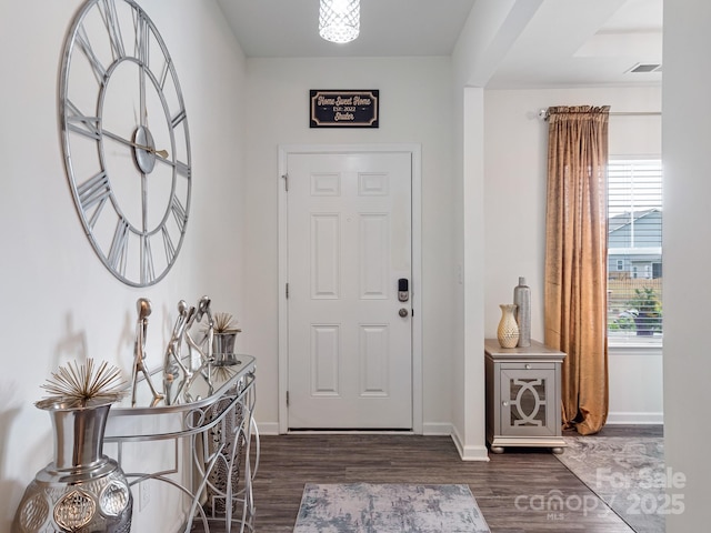 6381 Trinity Crossing Cir, Kannapolis, NC 28081 - foyer entrance with dark wood-style floors and baseboards