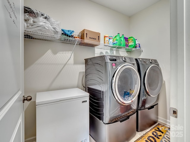 6381 Trinity Crossing Cir, Kannapolis, NC 28081 - washroom featuring washing machine and dryer and baseboards