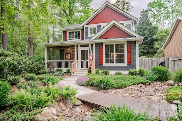 view of front of house with fence
