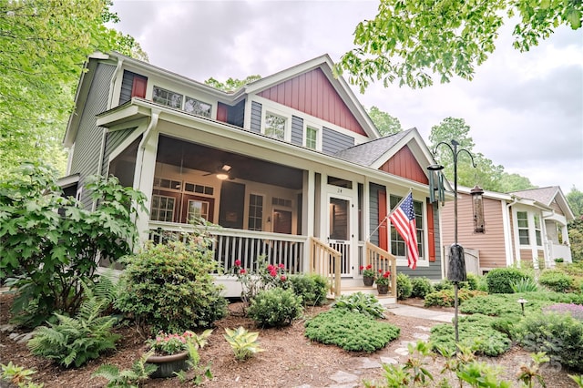craftsman-style house featuring board and batten siding, ceiling fan, and a porch