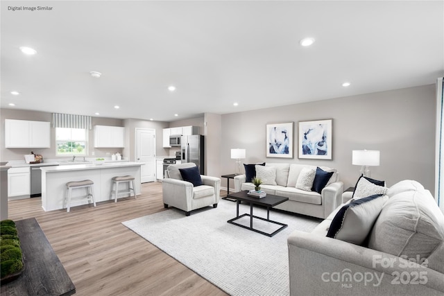102 Rose Ln Unit 1437, Pageland, SC 29728 - living room featuring light wood-style flooring and recessed lighting