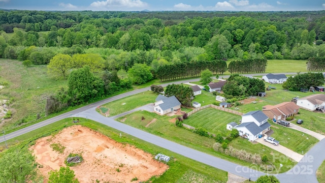 drone / aerial view of a heavily wooded area