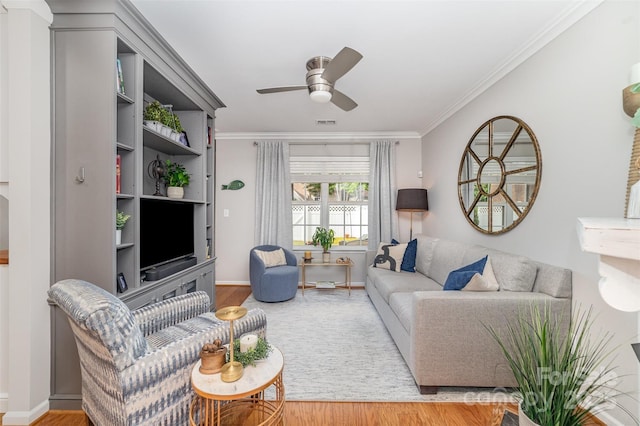 10617 Fuller Ridge Cir, Charlotte, NC 28270 - living room with wood finished floors, ceiling fan, ornamental molding, and baseboards