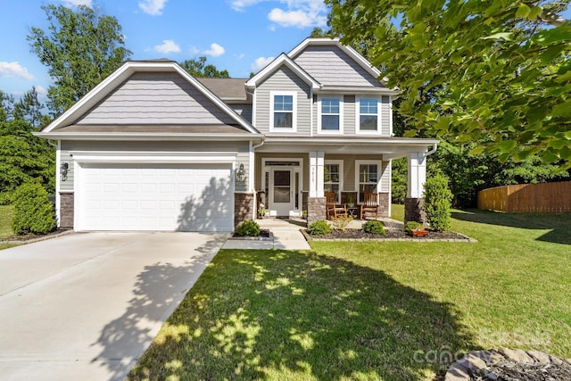 3615 Alamito Ln, Charlotte, NC 28214 - craftsman inspired home with an attached garage, a porch, concrete driveway, and stone siding