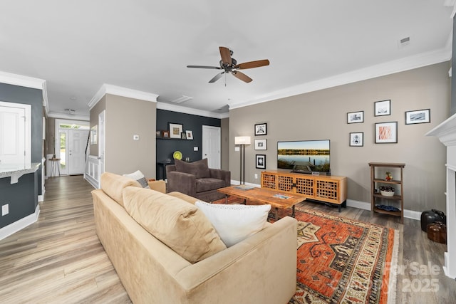 3615 Alamito Ln, Charlotte, NC 28214 - living area featuring ornamental molding, wood finished floors, baseboards, ceiling fan, and a fireplace