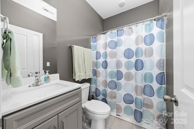 3615 Alamito Ln, Charlotte, NC 28214 - bathroom featuring toilet, tile patterned flooring, vanity, and a shower with curtain