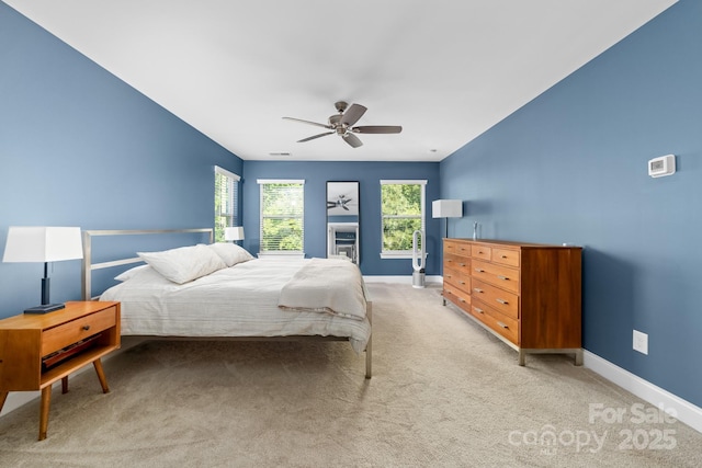 3615 Alamito Ln, Charlotte, NC 28214 - bedroom with baseboards, light colored carpet, and a ceiling fan