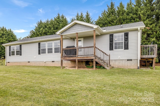 14 Phoenix Cir, Alexander, NC 28701 - view of front of house with crawl space, a front yard, stairs, and a deck