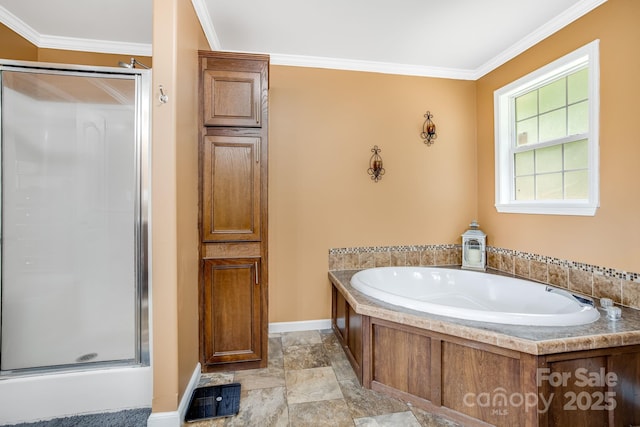 14 Phoenix Cir, Alexander, NC 28701 - bathroom with baseboards, a shower stall, a garden tub, ornamental molding, and stone finish floors