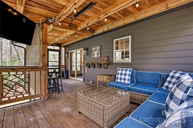 wooden deck featuring an outdoor living space