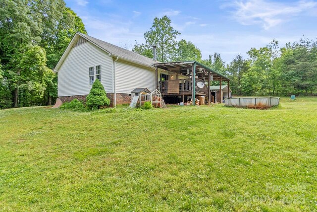 4155 Slanting Bridge Rd, Sherrills Ford, NC 28673 - back of property with a yard, an outdoor pool, a wooden deck, and crawl space