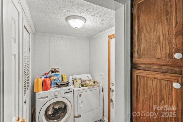 4155 Slanting Bridge Rd, Sherrills Ford, NC 28673 - washroom featuring washer and dryer, ornamental molding, and a textured ceiling