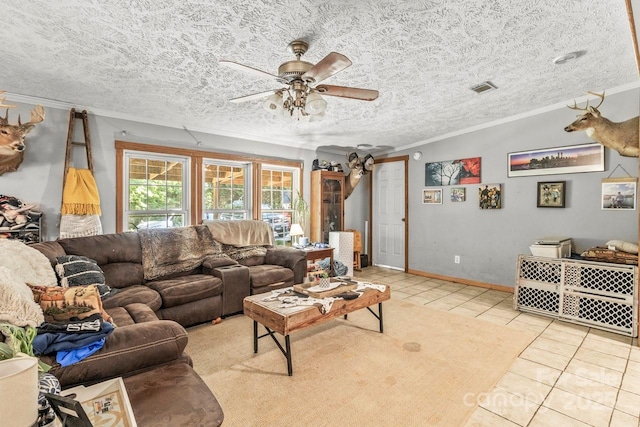 4155 Slanting Bridge Rd, Sherrills Ford, NC 28673 - living room featuring ornamental molding, light tile patterned floors, ceiling fan, baseboards, and a textured ceiling