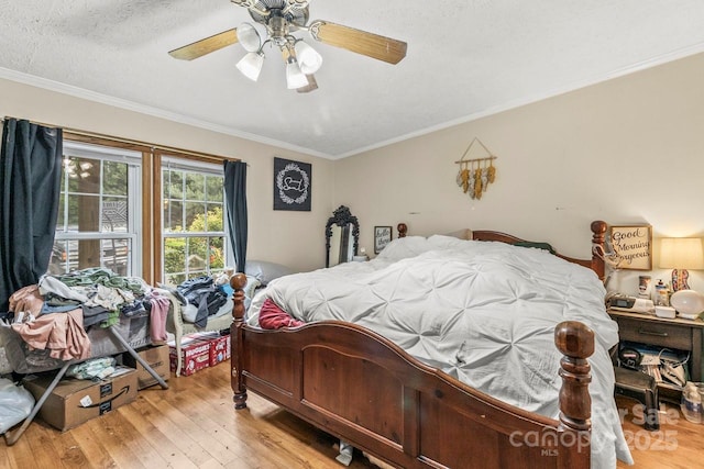4155 Slanting Bridge Rd, Sherrills Ford, NC 28673 - bedroom featuring light wood-style flooring, crown molding, ceiling fan, and a textured ceiling