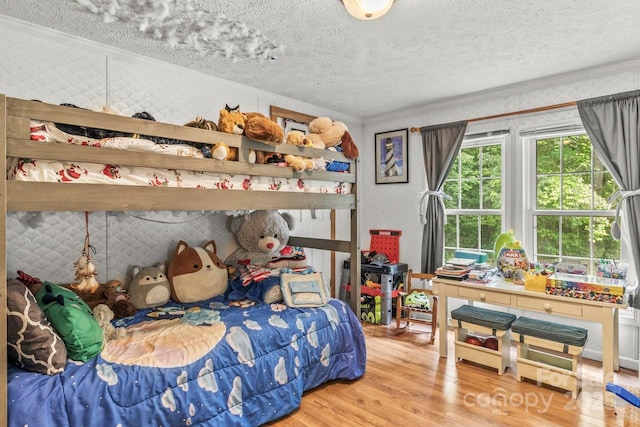 4155 Slanting Bridge Rd, Sherrills Ford, NC 28673 - bedroom featuring ornamental molding, wood finished floors, and a textured ceiling
