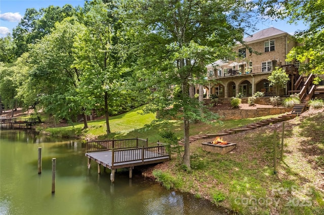 141 Ridge Top Rd, Mooresville, NC 28117 - dock with an outdoor fire pit, stairs, and a deck with water view
