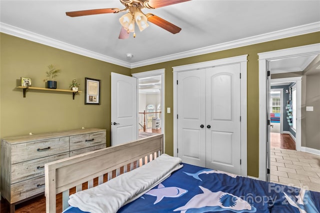 141 Ridge Top Rd, Mooresville, NC 28117 - bedroom with ornamental molding, a closet, ceiling fan, and baseboards