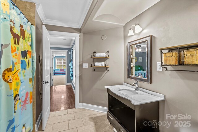 141 Ridge Top Rd, Mooresville, NC 28117 - full bathroom featuring ornamental molding, vanity, baseboards, tile patterned flooring, and curtained shower