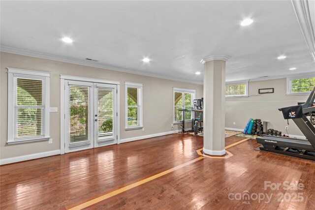 141 Ridge Top Rd, Mooresville, NC 28117 - workout area with ornate columns, ornamental molding, baseboards, recessed lighting, and wood finished floors
