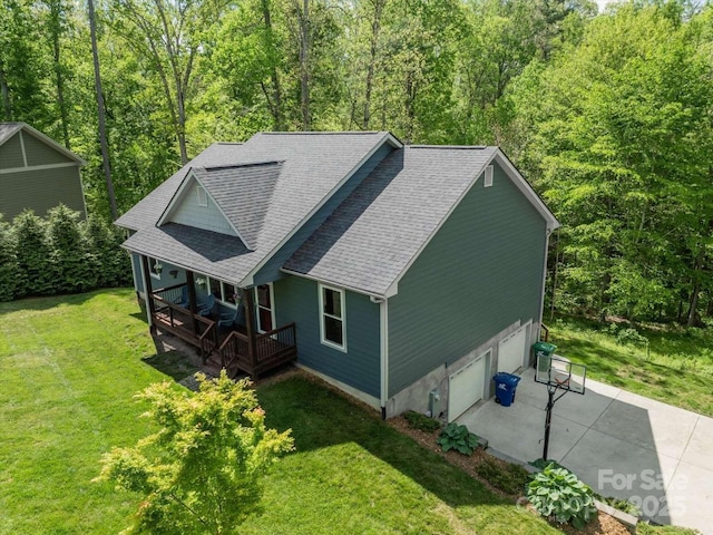 36 Nader Ave, Weaverville, NC 28787 - view of front of home with roof with shingles, concrete driveway, a front lawn, and a garage