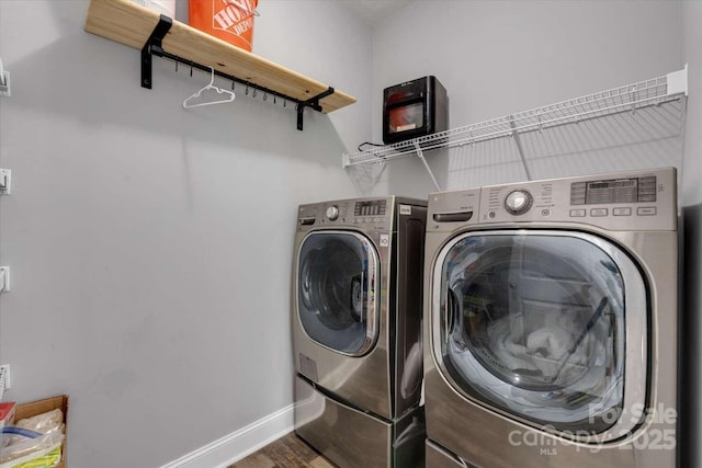 36 Nader Ave, Weaverville, NC 28787 - washroom with independent washer and dryer and wood finished floors