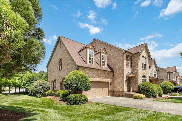 2346 Donnington Ln NW, Concord, NC 28027 - view of front of house featuring concrete driveway, an attached garage, brick siding, and a front yard