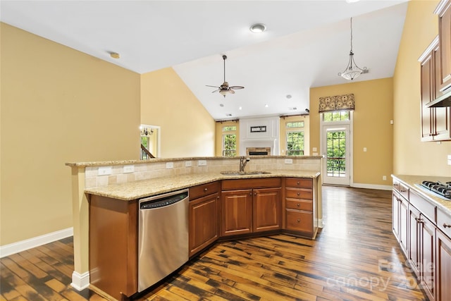 2346 Donnington Ln NW, Concord, NC 28027 - kitchen with stainless steel dishwasher, a sink, dark wood-type flooring, ceiling fan, and high vaulted ceiling