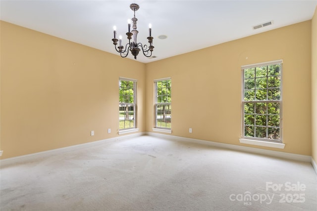 2346 Donnington Ln NW, Concord, NC 28027 - unfurnished room featuring a chandelier, baseboards, and carpet floors