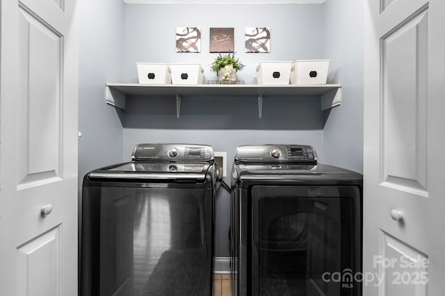 washroom with washer and clothes dryer