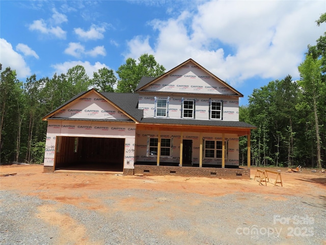 2099 Cedar Rd, York, SC 29745 - property under construction featuring crawl space, an attached garage, a porch, driveway, and a shingled roof
