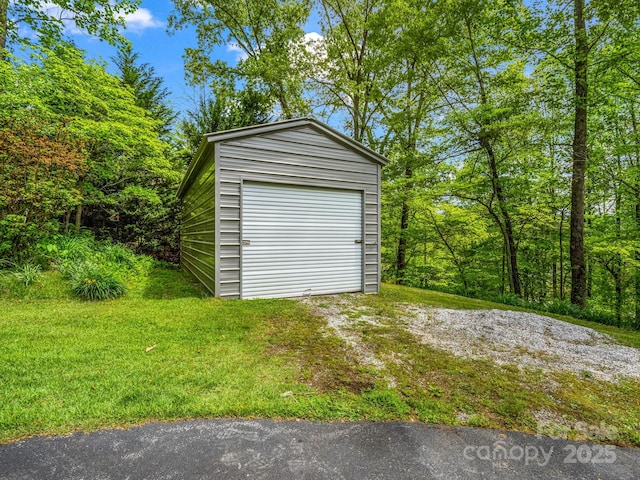 garage featuring driveway