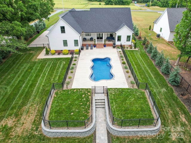 view of pool featuring a patio