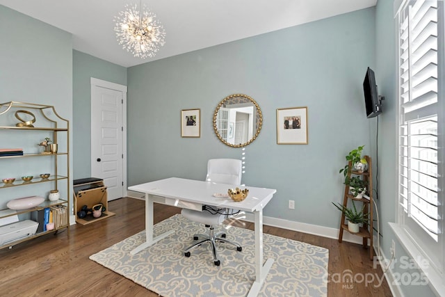 1502 Matthew Mcclure Cir, Davidson, NC 28036 - office area with wood finished floors, a chandelier, and baseboards