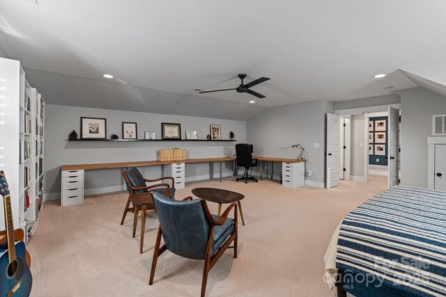 1502 Matthew Mcclure Cir, Davidson, NC 28036 - bedroom with an office area, light carpet, lofted ceiling, recessed lighting, and baseboards