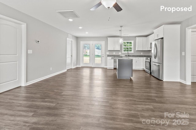 TBD Alf Hoover Rd Unit 4, Lincolnton, NC 28092 - kitchen with appliances with stainless steel finishes, open floor plan, a ceiling fan, a center island, and white cabinets