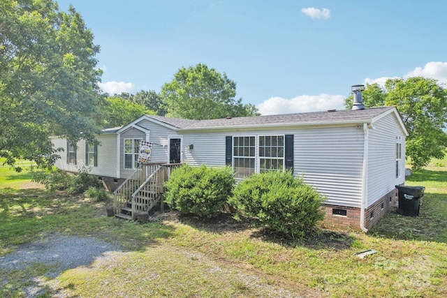 4122 Canal Rd, Marshville, NC 28103 - manufactured / mobile home with crawl space, a front yard, and roof with shingles