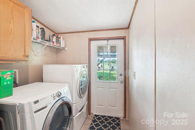 4122 Canal Rd, Marshville, NC 28103 - washroom featuring separate washer and dryer, cabinet space, a textured ceiling, and crown molding