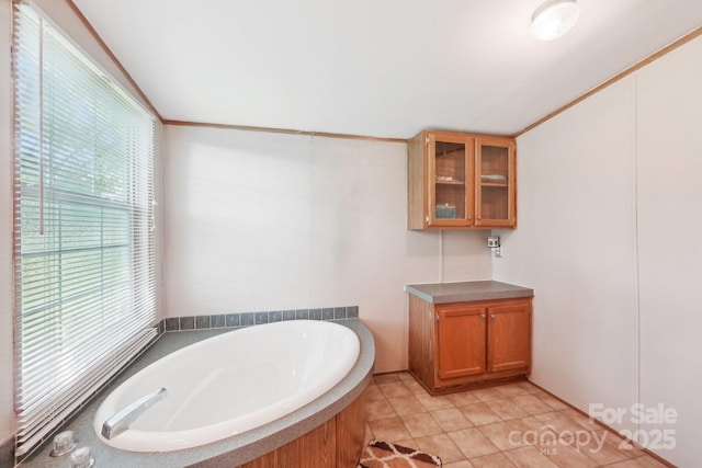 4122 Canal Rd, Marshville, NC 28103 - bathroom featuring a garden tub and tile patterned flooring