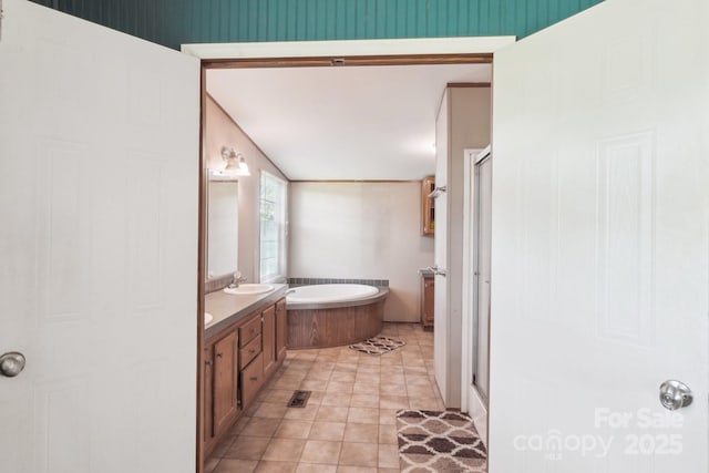 4122 Canal Rd, Marshville, NC 28103 - bathroom with a shower stall, a bath, and vanity