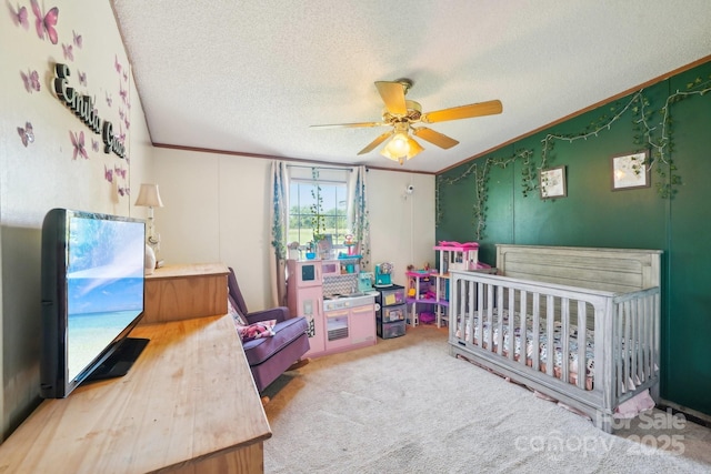 4122 Canal Rd, Marshville, NC 28103 - bedroom featuring a crib, a textured ceiling, ornamental molding, a ceiling fan, and carpet floors