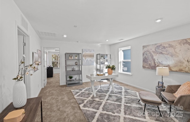 carpeted office with healthy amount of natural light, recessed lighting, and baseboards