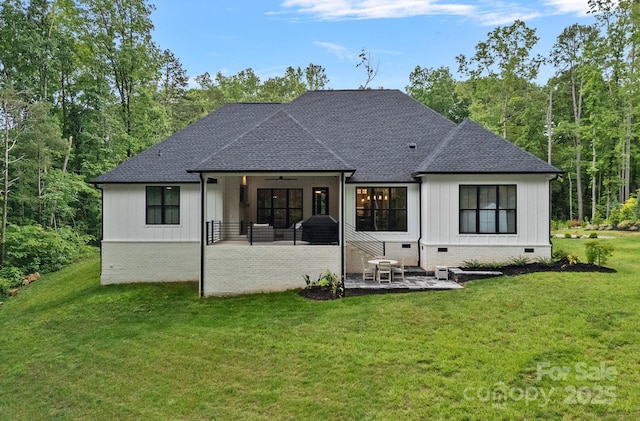 9564 Regent Dr, Davidson, NC 28036 - back of property featuring crawl space, roof with shingles, a ceiling fan, a patio area, and a lawn