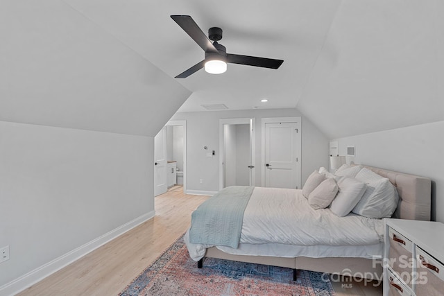 9564 Regent Dr, Davidson, NC 28036 - bedroom with light wood-style floors, baseboards, vaulted ceiling, and a ceiling fan