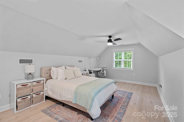 9564 Regent Dr, Davidson, NC 28036 - bedroom with light wood-type flooring, ceiling fan, vaulted ceiling, and baseboards