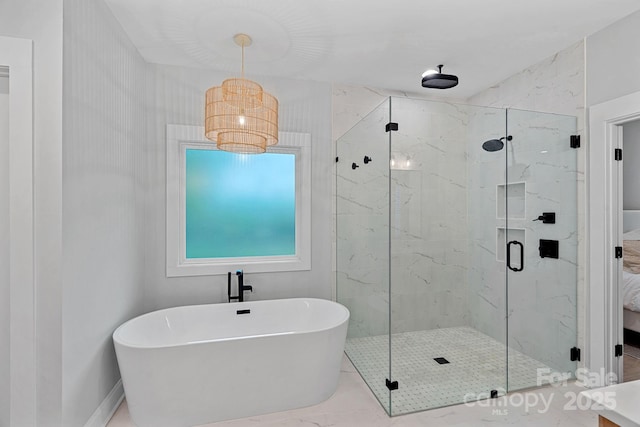 9564 Regent Dr, Davidson, NC 28036 - bathroom featuring a marble finish shower and a freestanding bath