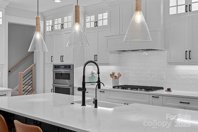 9564 Regent Dr, Davidson, NC 28036 - kitchen featuring stainless steel appliances, white cabinets, decorative backsplash, and recessed lighting