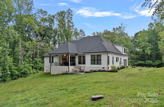 9564 Regent Dr, Davidson, NC 28036 - back of property with a yard, roof with shingles, and board and batten siding