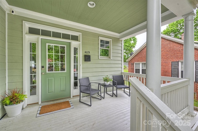 wooden deck with a porch